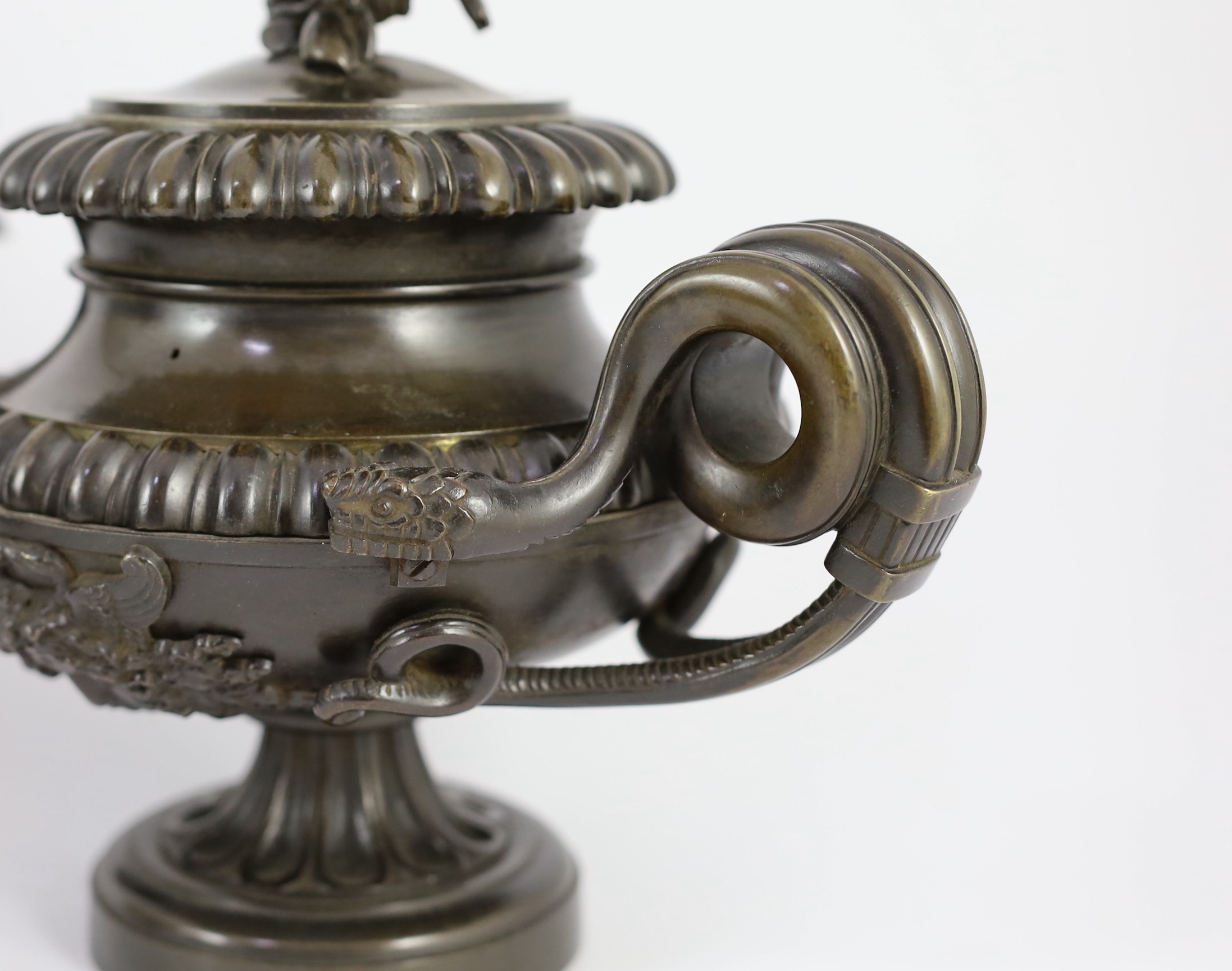 James De Ville, 367 Strand, London. A pair of Regency bronze oil lamps to a design by Thomas Hope, length 31cm depth 16cm height 25cm